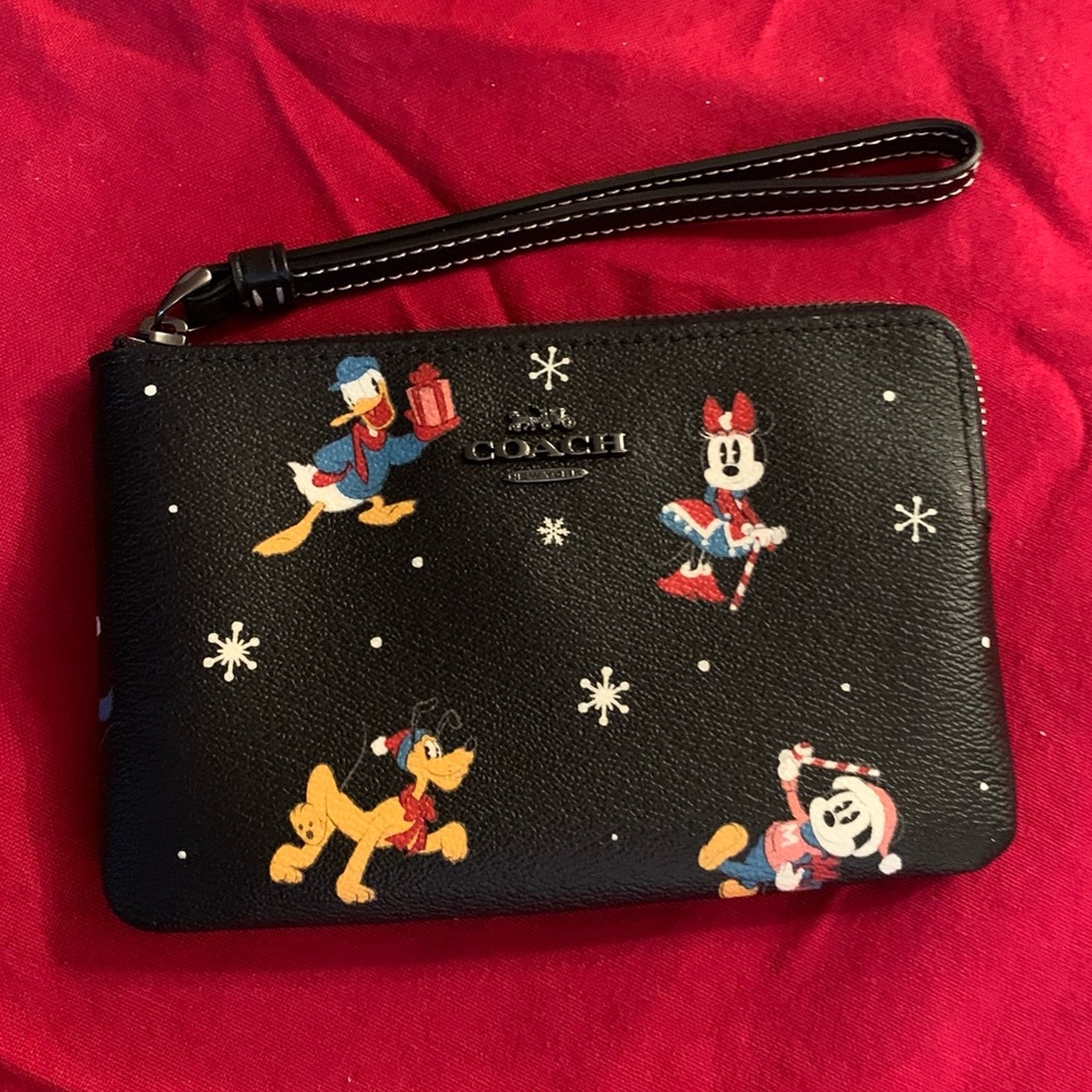 Authentic COACH Signature Coated leather Disney Xmas  print zip top wristlet - Picture 2 of 16